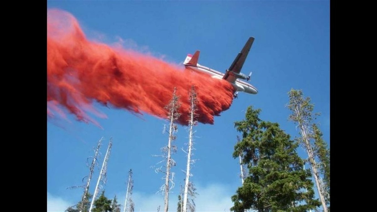 Air tanker retardant drop on wildfire