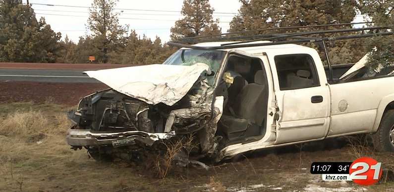 Two pickups were heavily damaged in nearly head-on crash Friday on state Highway 126 west of Redmond.