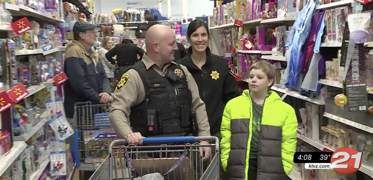 Hard to tell who has more fun at Shop with a Cop - the cops or the young shoppers