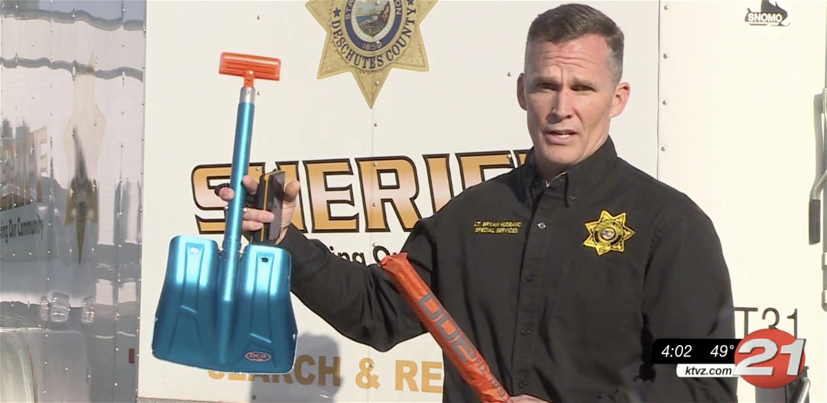 Deschutes County Sheriff's Search and Rescue Lt. Bryan Husband shows gear to bring in backcountry