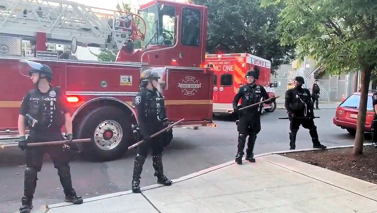 Seattle police fire at protest crash scene KING