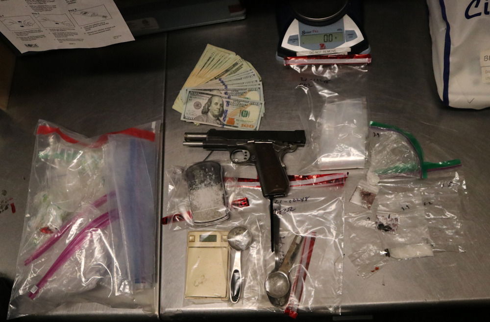 Drugs, cash and a handgun were seized Wednesday in raid on NE Bend home