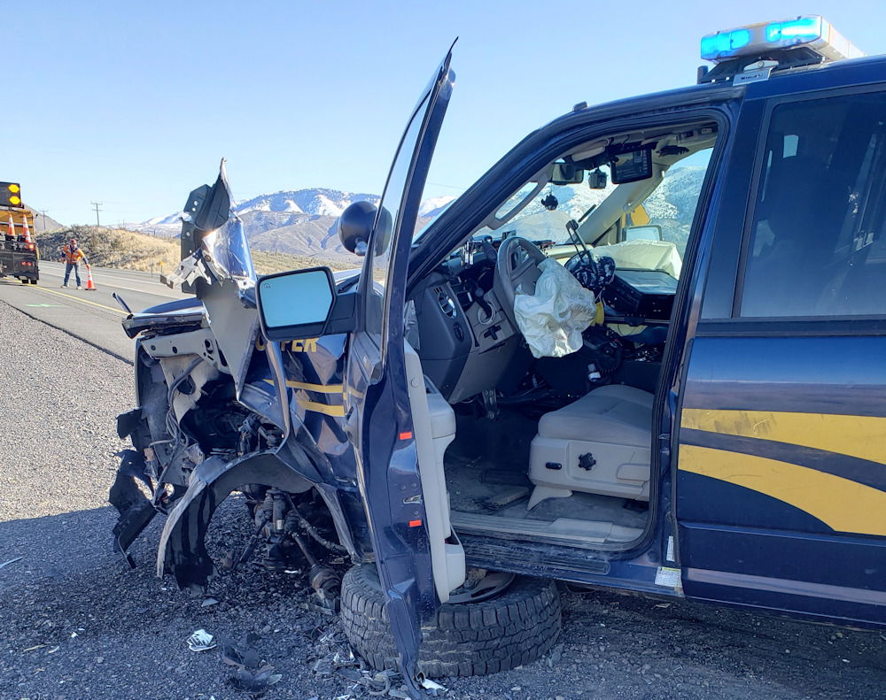 Oregon State Police trooper's patrol car shows damage from collision with wrong-way driver on I-84 Friday afternoon