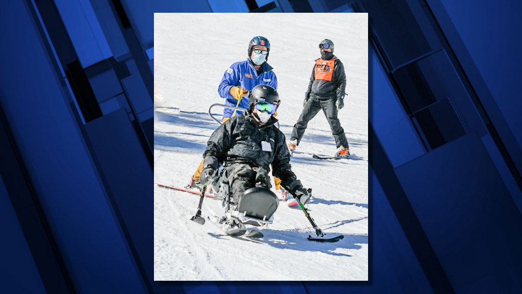 A bi-skier gains independence through the use of tethers in the Oregon Adaptive Sports program