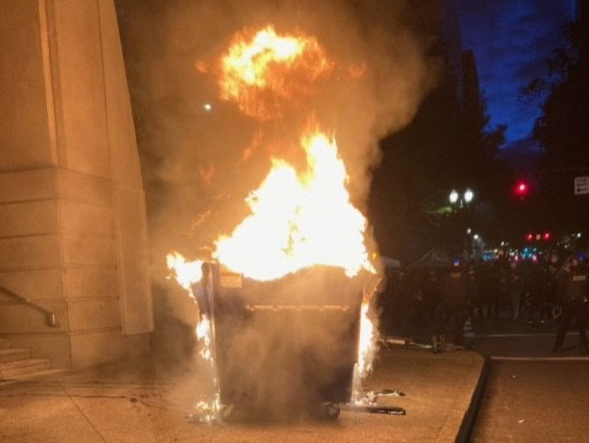 Dumpster set ablaze by Portland Justice Center Tuesday night