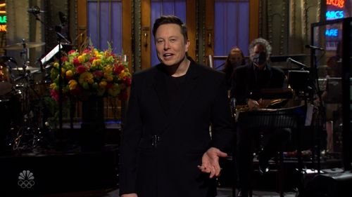 Elon Musk opens SNL by telling his mother that hes gifting her dogecoin for Mothers Day