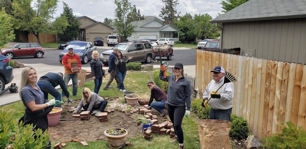 Windermere brokers in Bend helped Friday with upkeep of three seniors' homes on Community Service Day