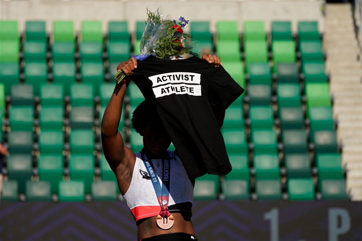 <i>Patrick Smith/Getty Images</i><br/>Gwendolyn Berry (left) stands on the podium having placed third in the hammer throw final at the US Olympic trials.