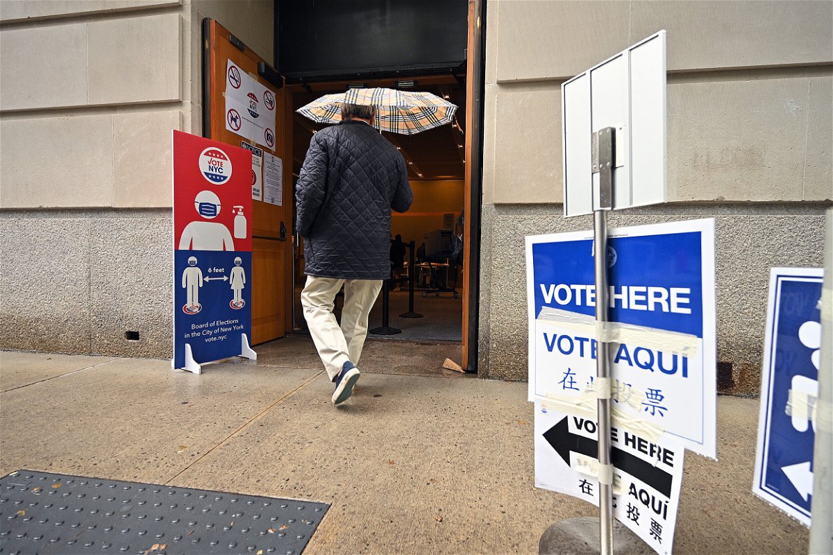 <i>Anthony Behar/Sipa USA</i><br/>A voter arrives at a polling station set up at The Metropolitan Museum of Art on New York's primary election day on June 22.