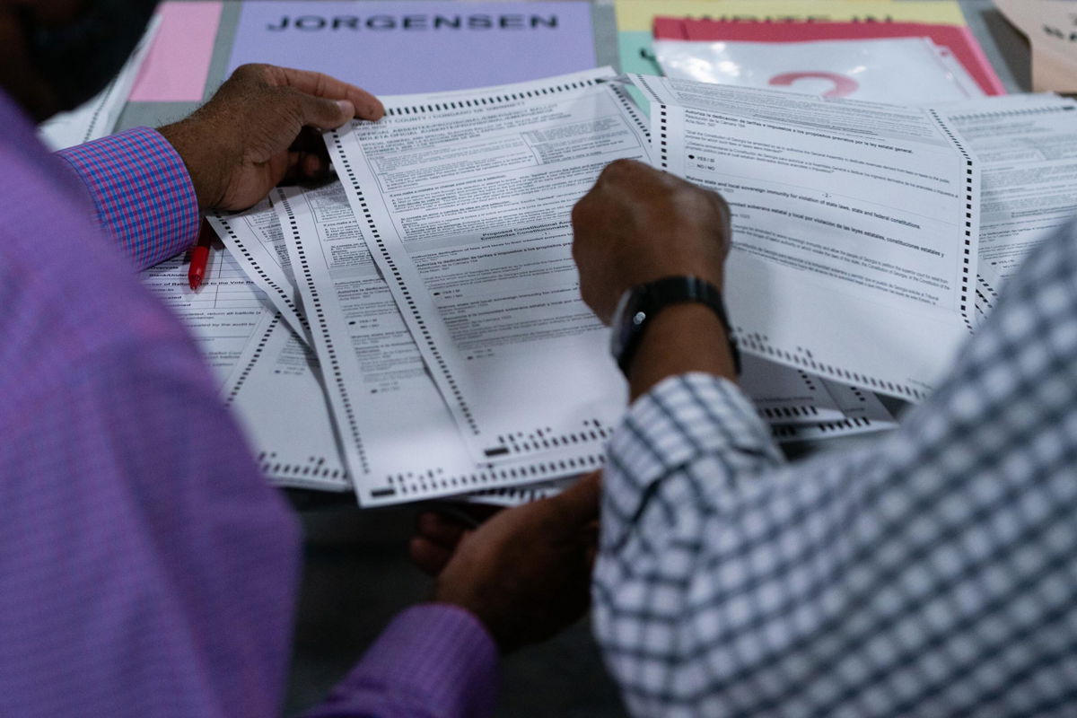 <i>Elijah Nouvelage/Bloomberg/Getty Images</i><br/>The Justice Department is launching a task force to address the rise in threats against election officials. This image shows the 2020 presidential election ballots during an audit in Lawrenceville
