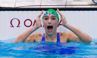 South Africa's Tatjana Schoenmaker reacts after winning the final of the women's 200m breaststroke to set a new world record during the Tokyo Olympic Games.