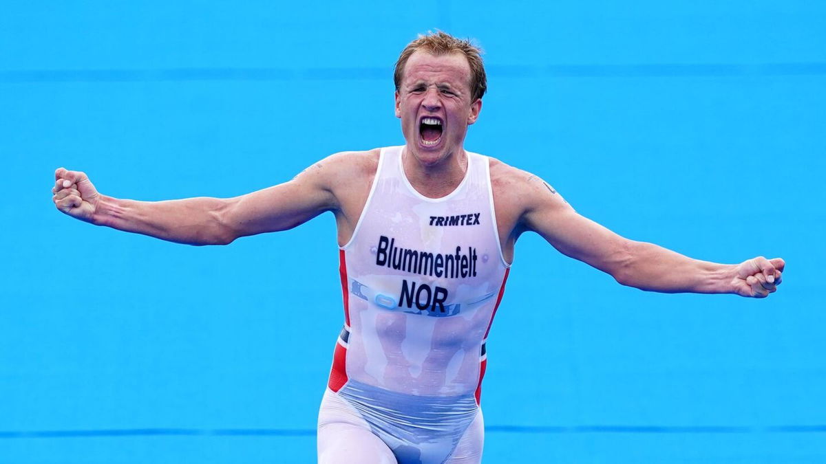 Norway's Kristian Blummenfelt celebrates winning the Men's Triathlon