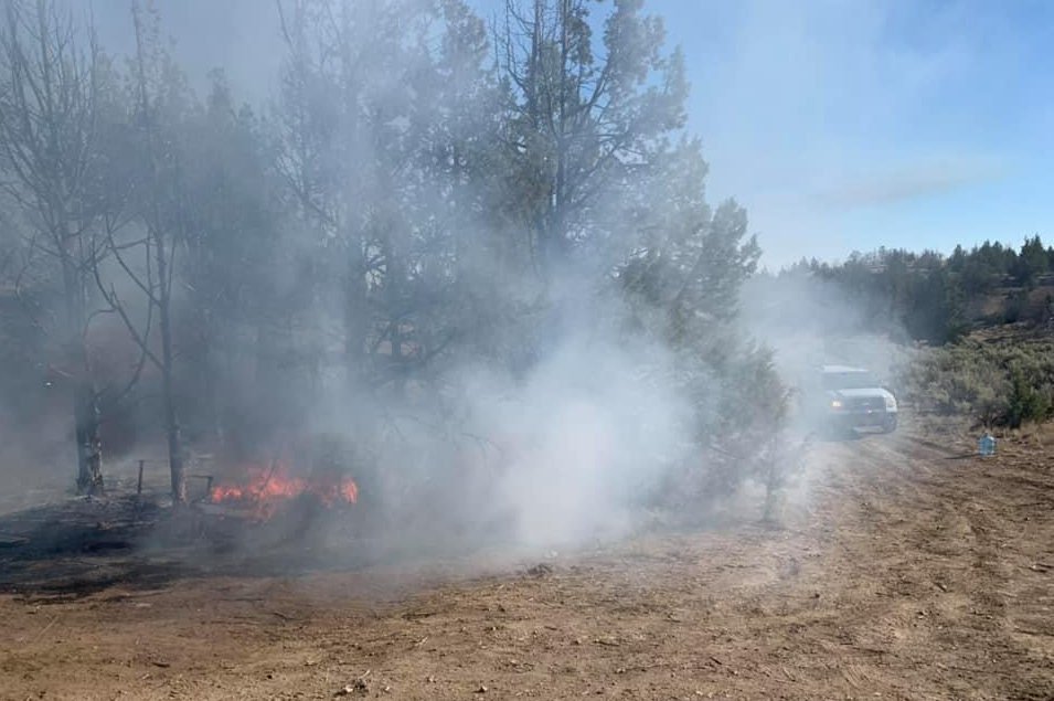 Property owners east of Madras helped fight camp trailer fire Saturday morning