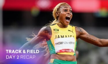 Elaine Thompson-Herah of Team Jamaica celebrates crossing the finish line to win the gold medal in the Women's 100m Final on day eight of the Tokyo 2020 Olympic Games