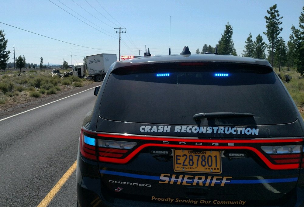 A La Pine woman was killed Tuesday in the collision of her SUV and a semi-truck on Huntington Road