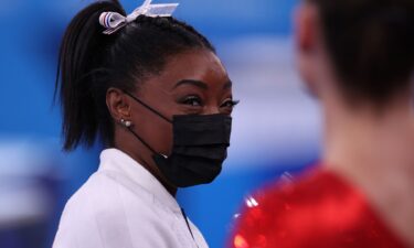 Simone Biles watches women's team final