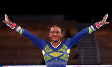 Rebeca Andrade competes on bars