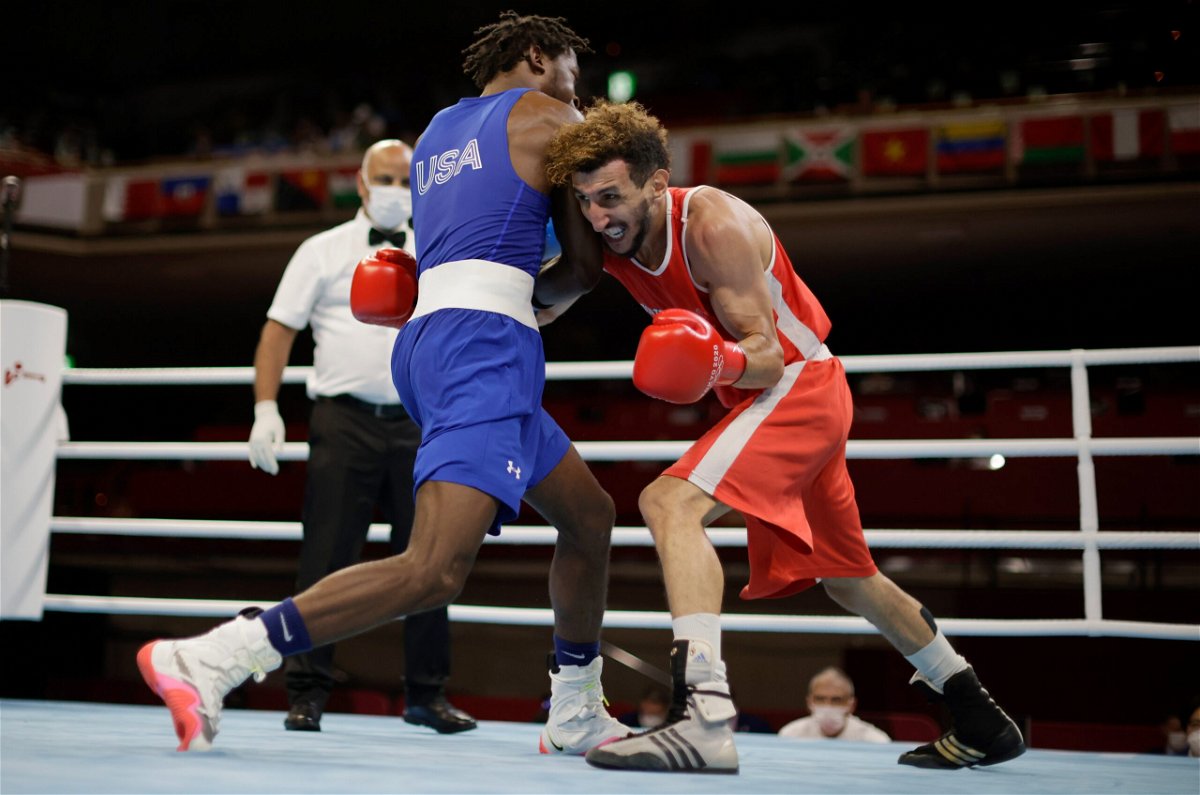 U.S. boxer Keyshawn Davis advances through Round of 16 via TKO of France's Sofiane Oumiha.