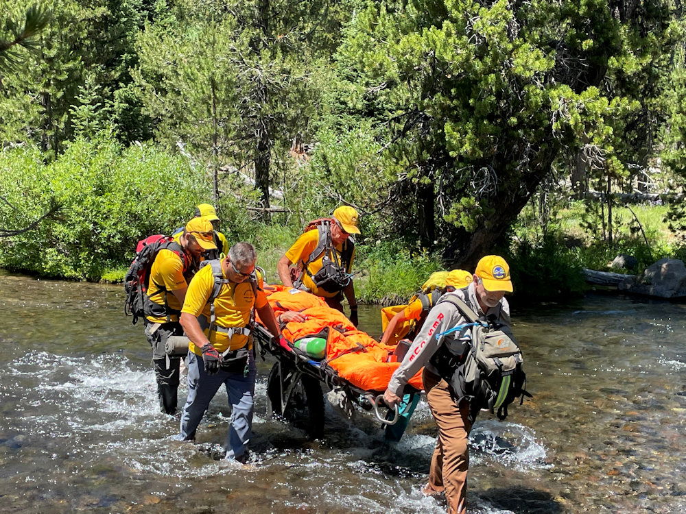 Deschutes County Sheriff's Search and Rescue team helps bring injured hiker to Green Lakes Trailhead on Thursday