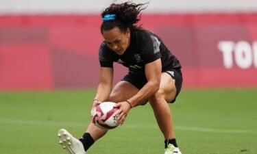 Portia Woodman of Team New Zealand scores a try.