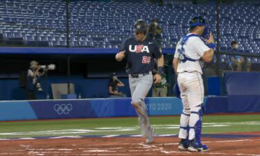 Member of the U.S. Olympic baseball team touches home plate