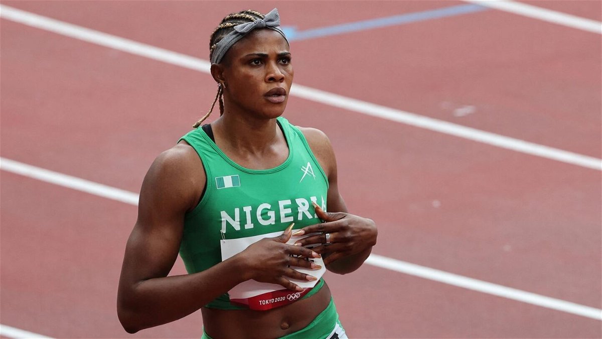 Nigeria's Blessing Okagbare reacts after winning her race in the women's 100m heats during the Tokyo 2020 Olympic Games