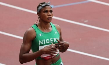 Nigeria's Blessing Okagbare reacts after winning her race in the women's 100m heats during the Tokyo 2020 Olympic Games