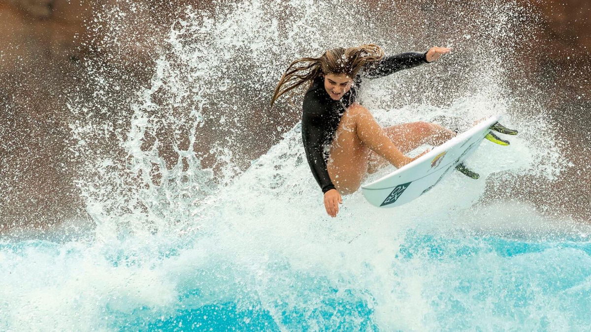 Caroline Marks surfing