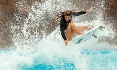 Caroline Marks surfing