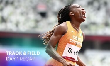 Ivory Coast's Marie-Josee Ta Lou reacts as she wins her race in the women's 100m heats during the Tokyo 2020 Olympic Games