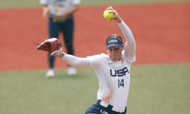 Monica Abbott pitches the ball against Canada