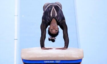 Simone Biles competes on vault