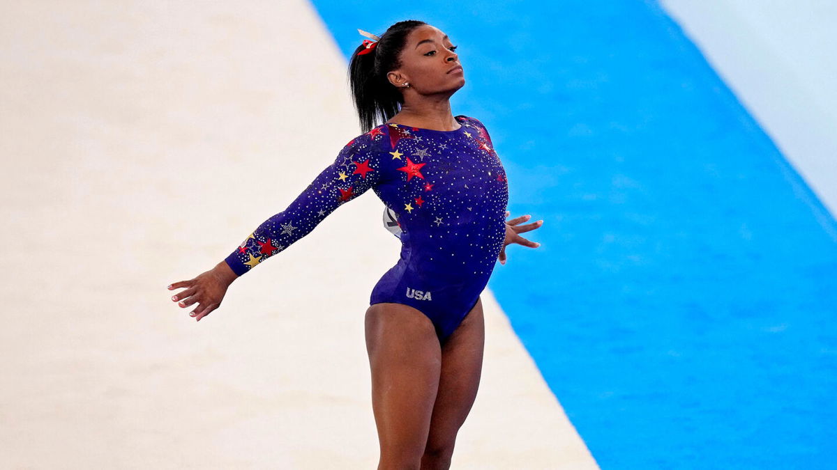 Simone Biles competes on floor