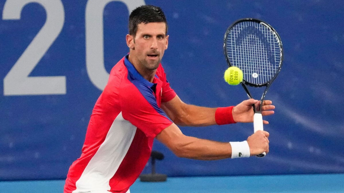 Novak Djokovic competes in Tokyo