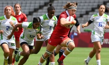 Canada's Karen Paquin runs with the ball during the women's pool B rugby sevens match between Canada and Brazil during the Tokyo 2020 Olympics