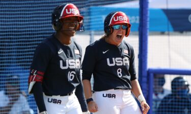 Michelle Moultrie and Haylie McCleney of Team USA react to Ali Aguilar's two-run single