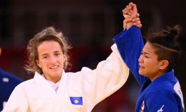 Kosovo's Distria Krasniqi celebrates winning the judo women's final versus Japan's Funa Tonaki