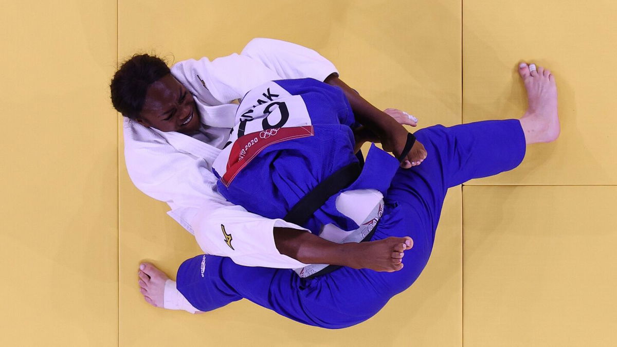 France's Clarisse Agbegnenou defeats Tina Trstenjak of Slovenia for gold