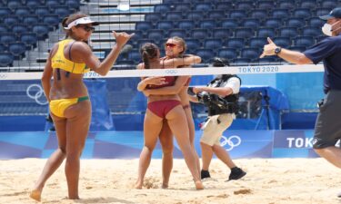 Tina Graudina and Anastasija Kravcenoka of Latvia celebrate after defeating Team Brazil.