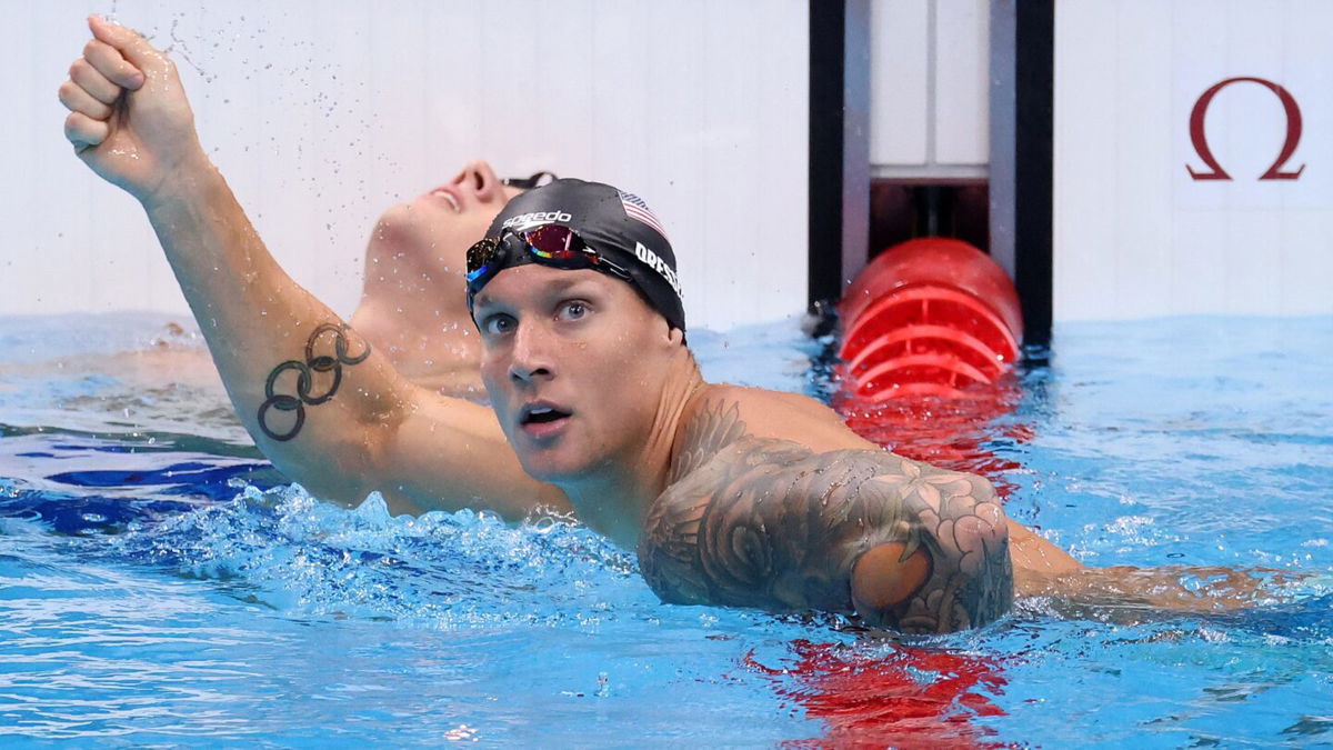 Caeleb Dressel of Team USA reacts after winning the second semifinal of the Men's 100m Butterfly.