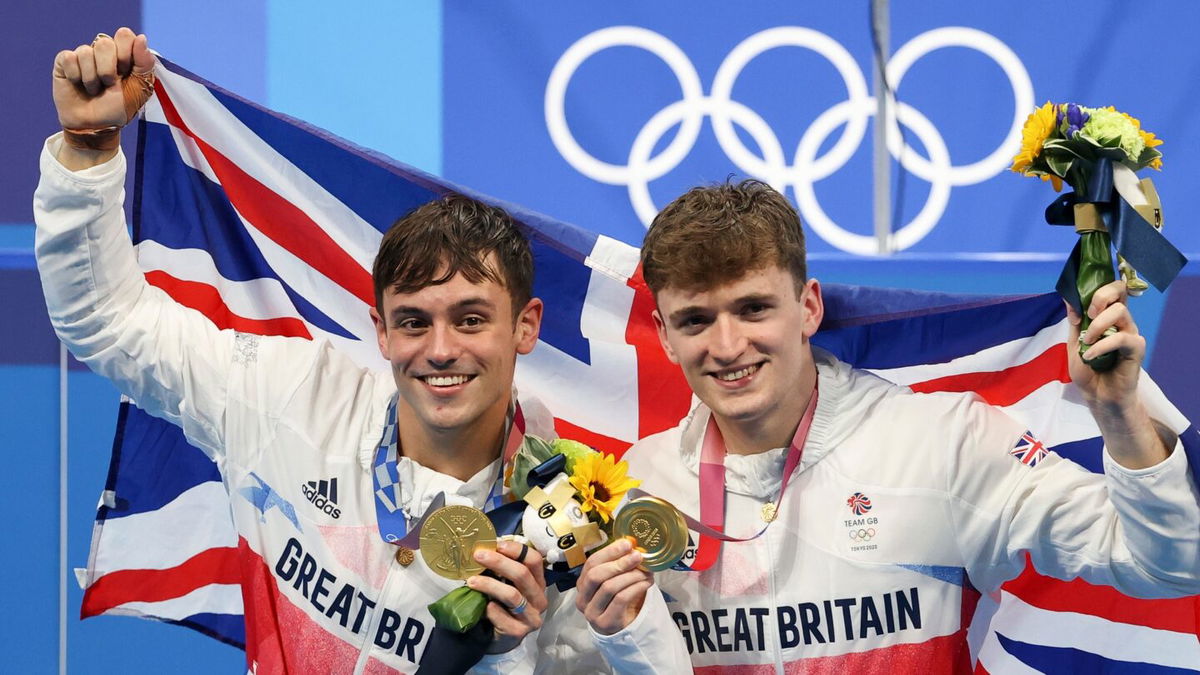 Tom Daley and Matty Lee celebrate winning gold in the men's synchro 10m platform