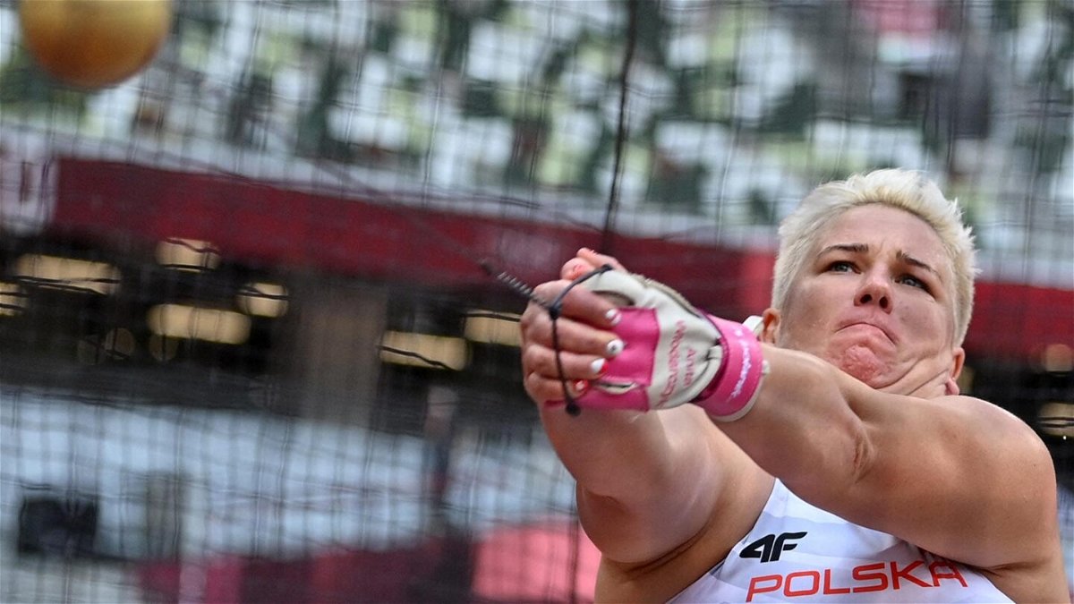 Poland's Anita Wlodarczyk competes in the women's hammer throw qualification during the Tokyo 2020 Olympic Games