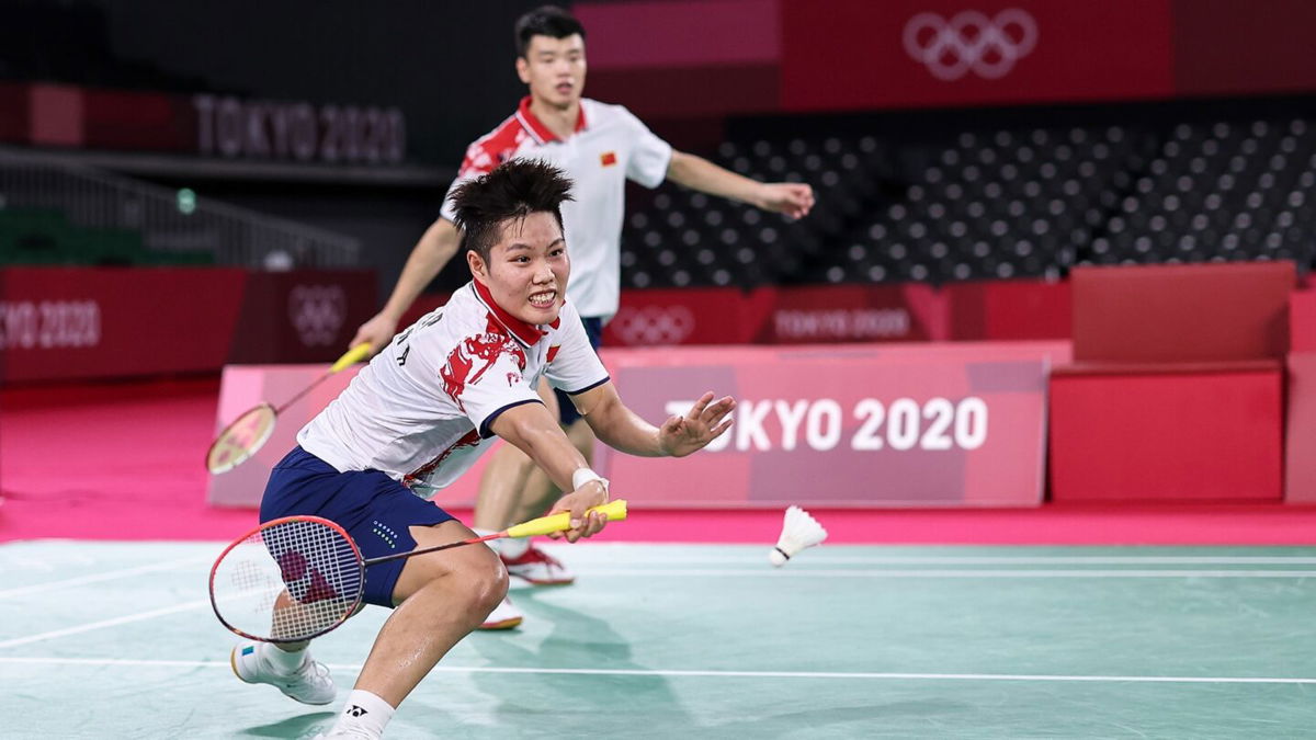 Wang Yilyu and Huang Dongping play in the badminton mixed doubles gold medal match against Zheng Siwei and Huang Yaqiong in Tokyo