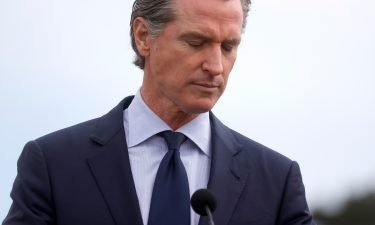 Gavin Newsom speaks during a news conference after touring the vaccination clinic on April 6 in San Francisco