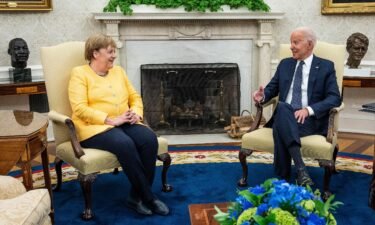 German Chancellor Angela Merkel and U.S. President Joe Biden make brief remarks to the press before a meeting in the Oval Office at the White House on July 15 in Washington