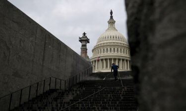 A worker cleans the steps near the U.S. Capitol in Washington