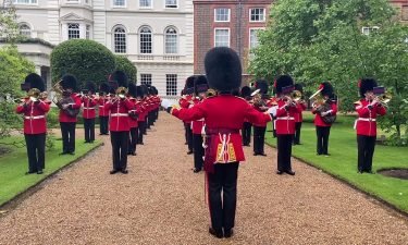 The band of the Coldstream Guards played "Three Lions" and "Sweet Caroline" at Clarence House at Prince Charles's request.