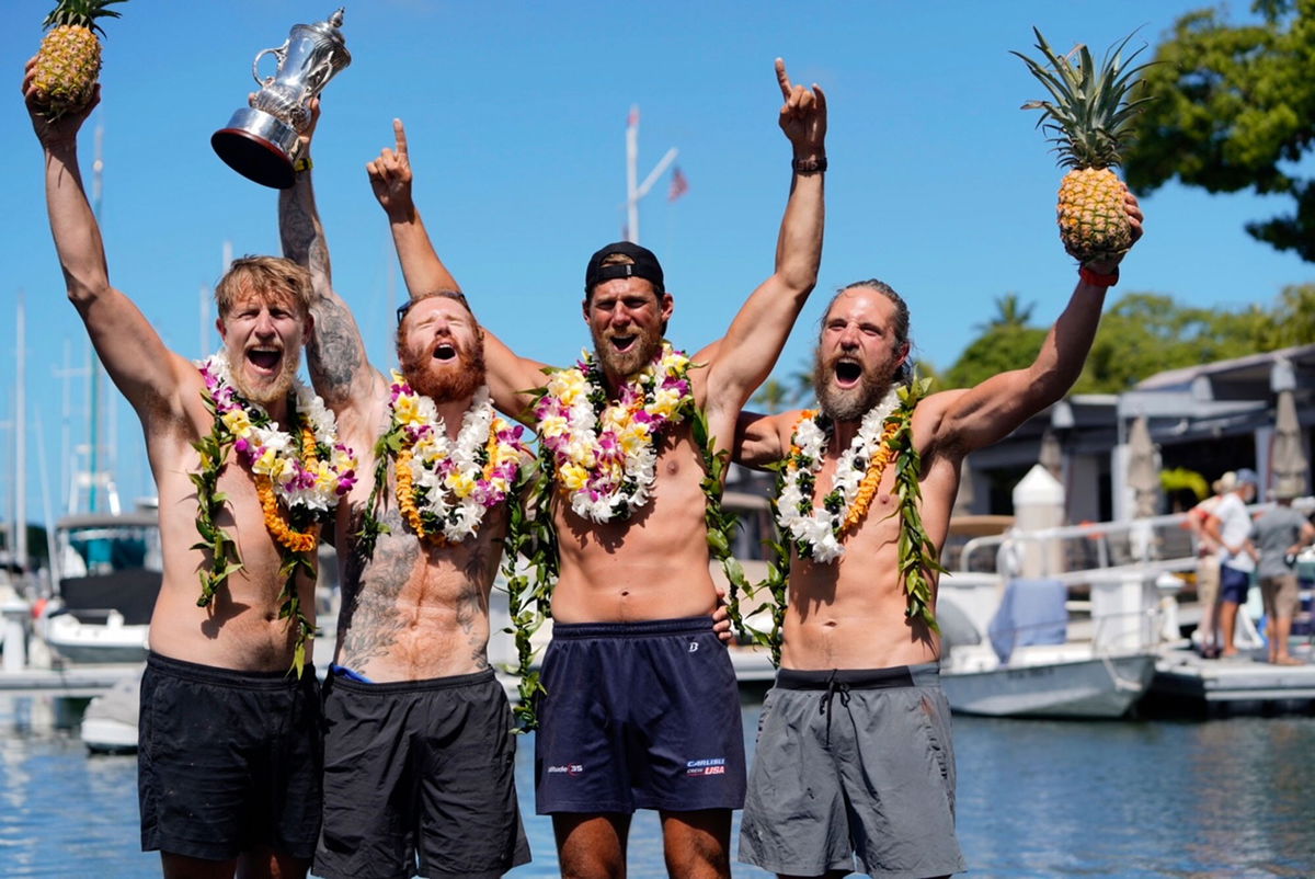 <i>Mikey Brown/Hawaii Sports Photography/Great Pacific Race/AP</i><br/>The Lat 35 team celebrates after rowing from San Francisco to Honolulu.