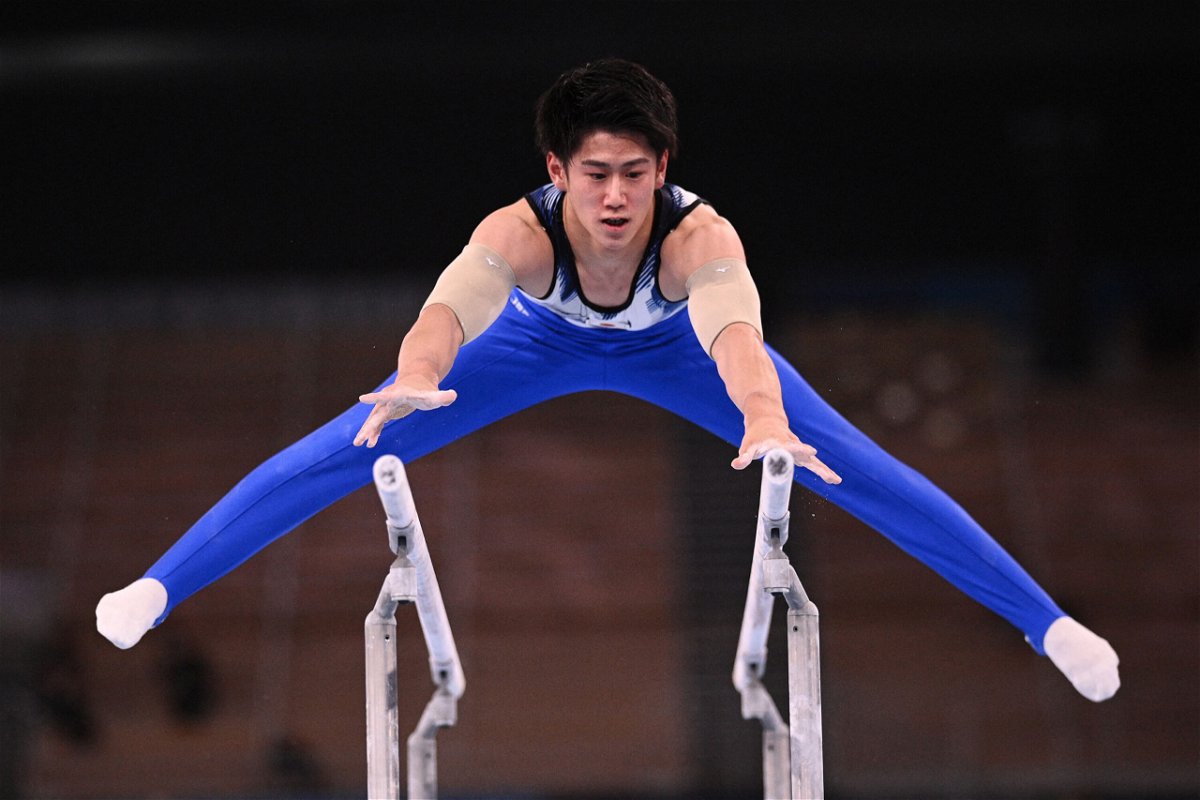 <i>Martin Bureau/AFP/Getty Images</i><br/>Japan's Daiki Hashimoto competes in the parallel bars event of the artistic gymnastics men's all-around final during the Tokyo 2020 Olympic Games at the Ariake Gymnastics Centre in Tokyo on July 28