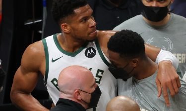 Giannis Antetokounmpo is helped off the court after being injured during Game 4 of the Eastern Conference Finals.